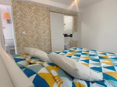 Un ou plusieurs lits dans un hébergement de l'établissement Gîte PEGASUS - 5 min plage