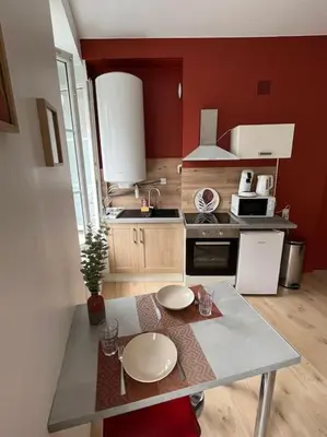 Cuisine ou kitchenette dans l'établissement La pause détente