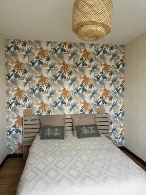 Un ou plusieurs lits dans un hébergement de l'établissement Appartement 35 m2 1er étage 200 m de la mer avec jardin