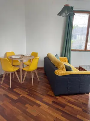 Coin salon dans l'établissement Appartement 35 m2 1er étage 200 m de la mer avec jardin