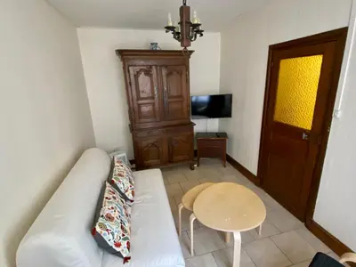 Télévision ou salle de divertissement dans l'établissement Charming fisher house on the Seaside
