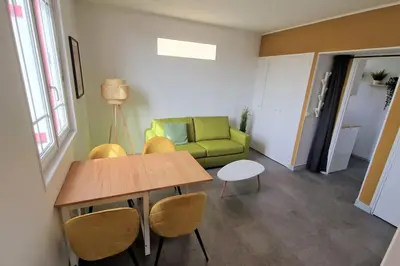 Coin salon dans l'établissement Appartement Ouistreham proche centre et plage