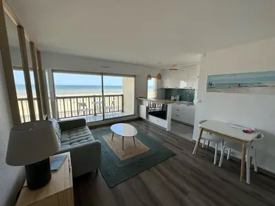 Coin salon dans l'établissement Vue mer exceptionnelle à Cabourg