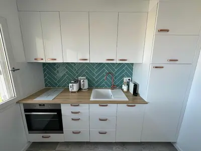 Cuisine ou kitchenette dans l'établissement Vue mer exceptionnelle à Cabourg