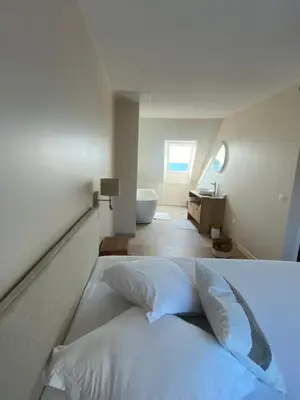 Un ou plusieurs lits dans un hébergement de l'établissement Granville / Maison entièrement rénovée à 100 m des plages