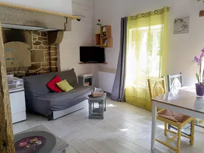 Télévision ou salle de divertissement dans l'établissement Gîte La Boulangerie au moulin Neuf