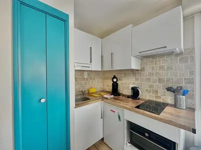 Cuisine ou kitchenette dans l'établissement Le petit Courseulles - entre le port et la mer