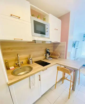 Cuisine ou kitchenette dans l'établissement LAKAZ CREOLE - Caen Centre