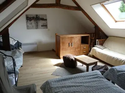 Coin salon dans l'établissement Domaine de Valmeray Gîte