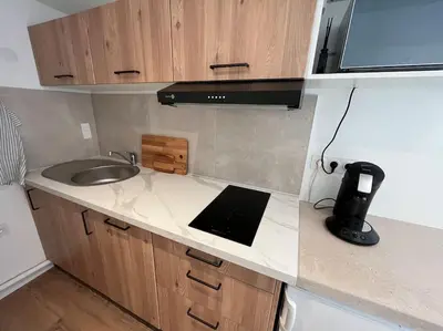 Cuisine ou kitchenette dans l'établissement Studio Cosy centre historique