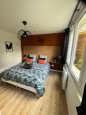 Un ou plusieurs lits dans un hébergement de l'établissement Beau Loft room proche mont saint Michel jaccuzi illimité en plein centre Avranches