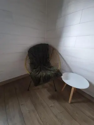 Coin salon dans l'établissement Le Chalet de St Vigor