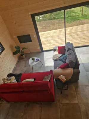 Coin salon dans l'établissement Le Chalet de St Vigor
