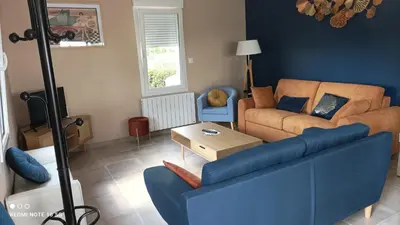 Coin salon dans l'établissement Le jardin de Chouchat