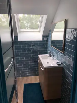 Salle de bains dans l'établissement Le Bout du Monde