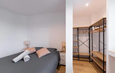 Un ou plusieurs lits dans un hébergement de l'établissement Appt premium Centre Château terrasse 2 chambres 6p vue exceptionnelle