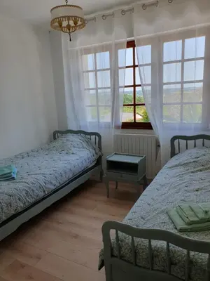 Un ou plusieurs lits dans un hébergement de l'établissement Maison dans le bourg