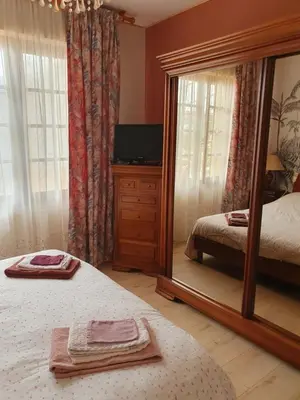 Un ou plusieurs lits dans un hébergement de l'établissement Maison dans le bourg