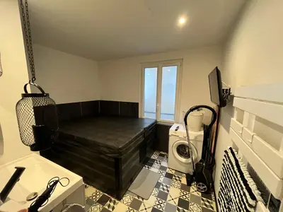 Coin salon dans l'établissement Coin de paradis avec spa illimité en plein centre Avranches