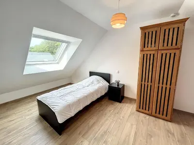 Un ou plusieurs lits dans un hébergement de l'établissement Charmante maison neuve proche plage, 4 chambres, 7 couchages, jardin, parking et tout confort - FR-1-361-511