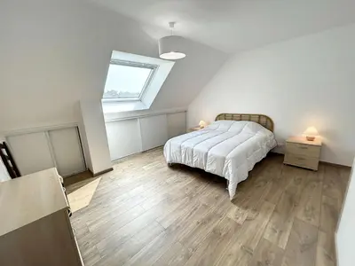 Un ou plusieurs lits dans un hébergement de l'établissement Charmante maison neuve proche plage, 4 chambres, 7 couchages, jardin, parking et tout confort - FR-1-361-511