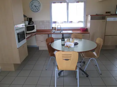 Cuisine ou kitchenette dans l'établissement Village de Gîtes de l'Anse de Moidrey