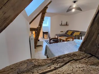 Un ou plusieurs lits dans un hébergement de l'établissement Authentique appartement de charme - Accès direct Voie Verte au coeur de la Suisse Normande