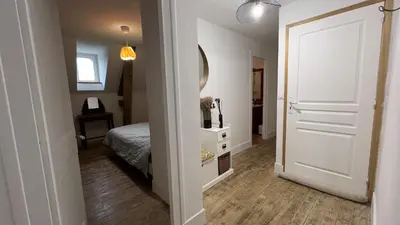 Un ou plusieurs lits dans un hébergement de l'établissement Authentique appartement de charme - Accès direct Voie Verte au coeur de la Suisse Normande