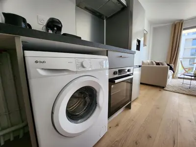 Cuisine ou kitchenette dans l'établissement Le Quai des Bleus