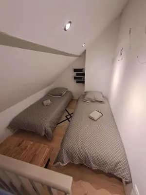 Un ou plusieurs lits dans un hébergement de l'établissement Le triplex Côté plage plein Sud