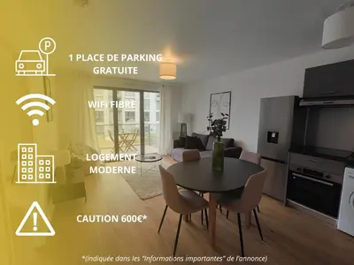 Télévision ou salle de divertissement dans l'établissement Le Quai des Verts