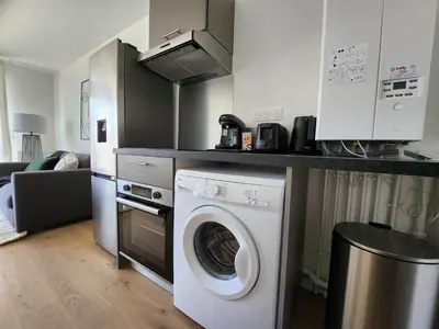 Cuisine ou kitchenette dans l'établissement Le Quai des Verts