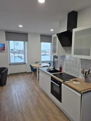 Cuisine ou kitchenette dans l'établissement Gîte la rose des vents