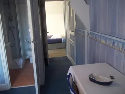 Un ou plusieurs lits dans un hébergement de l'établissement Villa les Dunes
