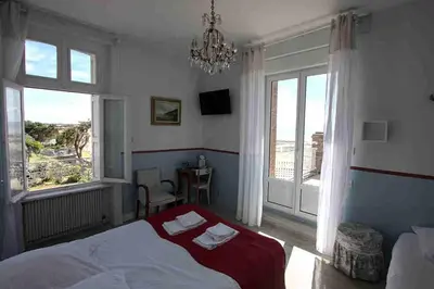 Un ou plusieurs lits dans un hébergement de l'établissement Villa les Dunes
