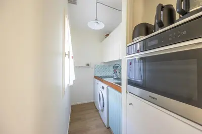 Cuisine ou kitchenette dans l'établissement Marée Haute et Marée Basse - 1 Appartement et 1 Studio proche de la plage