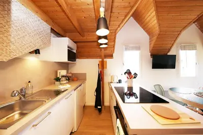 Cuisine ou kitchenette dans l'établissement Marée Haute et Marée Basse - 1 Appartement et 1 Studio proche de la plage