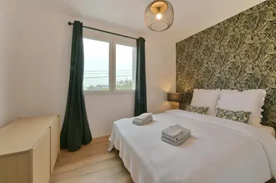 Un ou plusieurs lits dans un hébergement de l'établissement Le Cotentin - Joli appt 2 chambres à Carentan