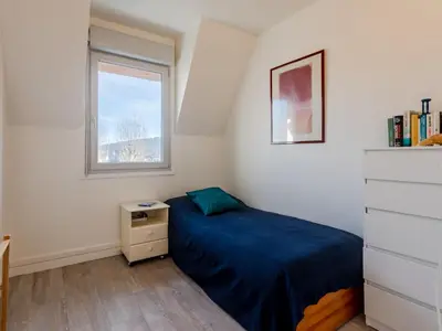 Un ou plusieurs lits dans un hébergement de l'établissement Apartment Eurydice by Interhome