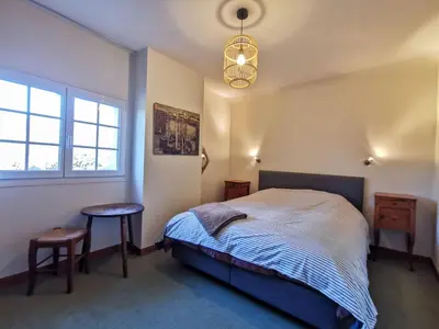 Un ou plusieurs lits dans un hébergement de l'établissement Holiday Home L'ilet by Interhome