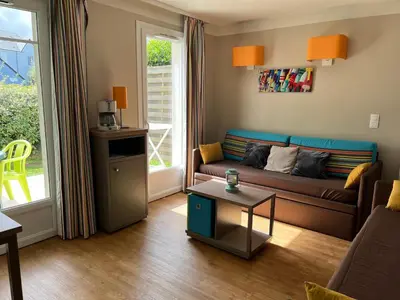 Coin salon dans l'établissement L'AIGRETTE - Appartement 5 pers - Courseulles port de plaisance