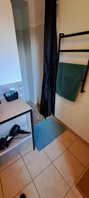 Un ou plusieurs lits dans un hébergement de l'établissement Cottage La loge