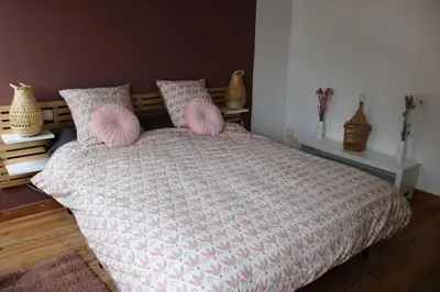 Un ou plusieurs lits dans un hébergement de l'établissement Koh'm à la maison