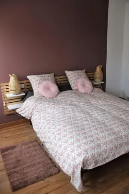 Un ou plusieurs lits dans un hébergement de l'établissement Koh'm à la maison
