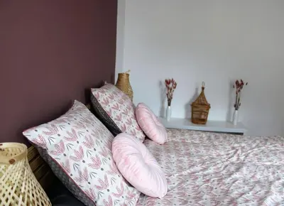 Un ou plusieurs lits dans un hébergement de l'établissement Koh'm à la maison