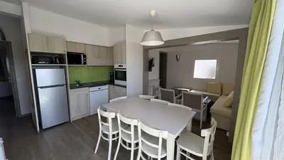 Cuisine ou kitchenette dans l'établissement VVF Cotentin Îles anglo-normandes