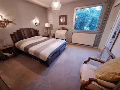 Un ou plusieurs lits dans un hébergement de l'établissement Woodland's House