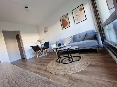 Coin salon dans l'établissement Appartement refait à neuf, 4 pers à Courseulles