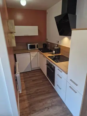 Cuisine ou kitchenette dans l'établissement Appartement refait à neuf, 4 pers à Courseulles
