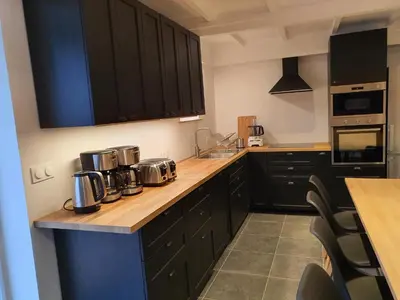 Cuisine ou kitchenette dans l'établissement Au jardin de Capucine